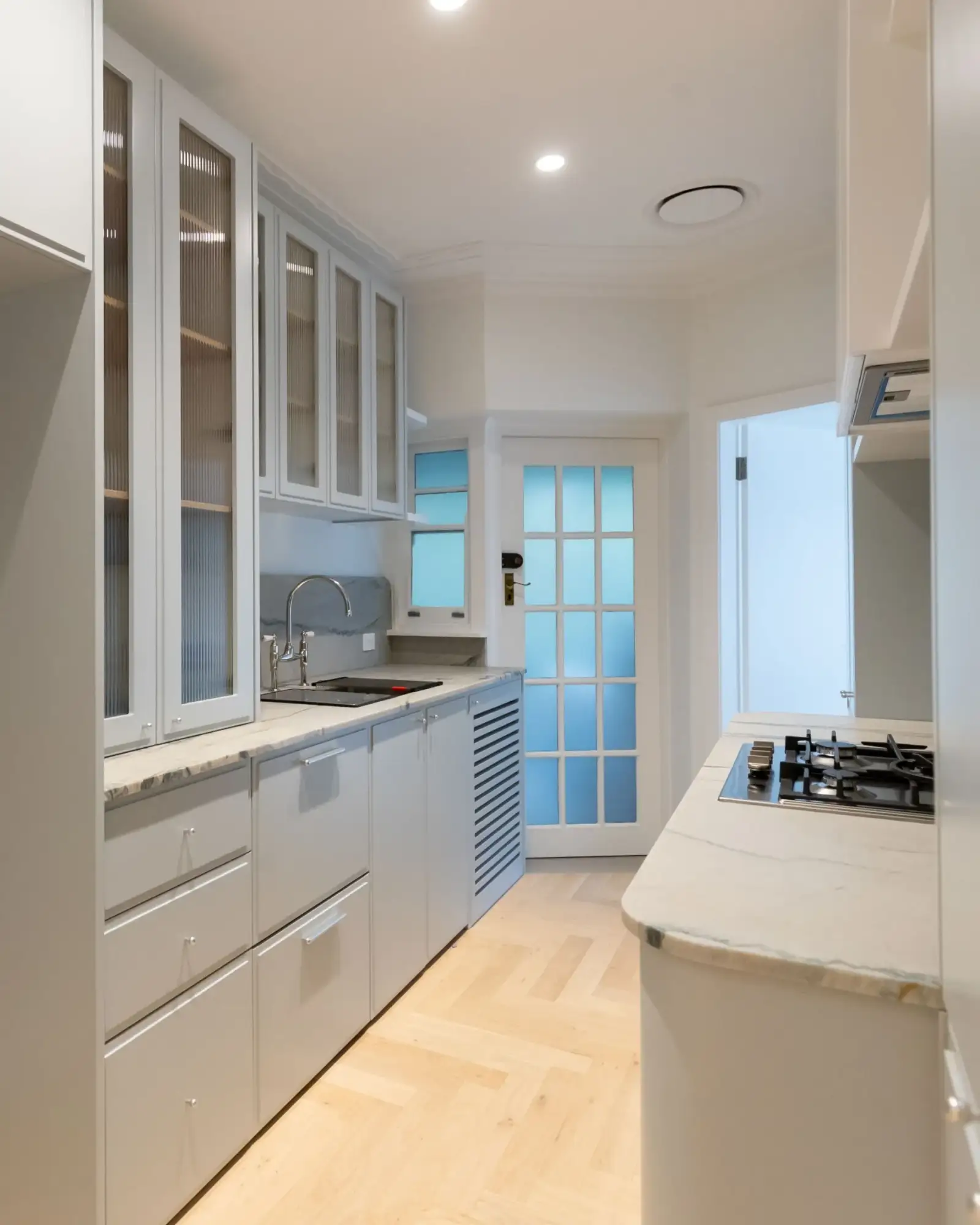 Eastern Project - galley kitchen with herringbone oak flooring