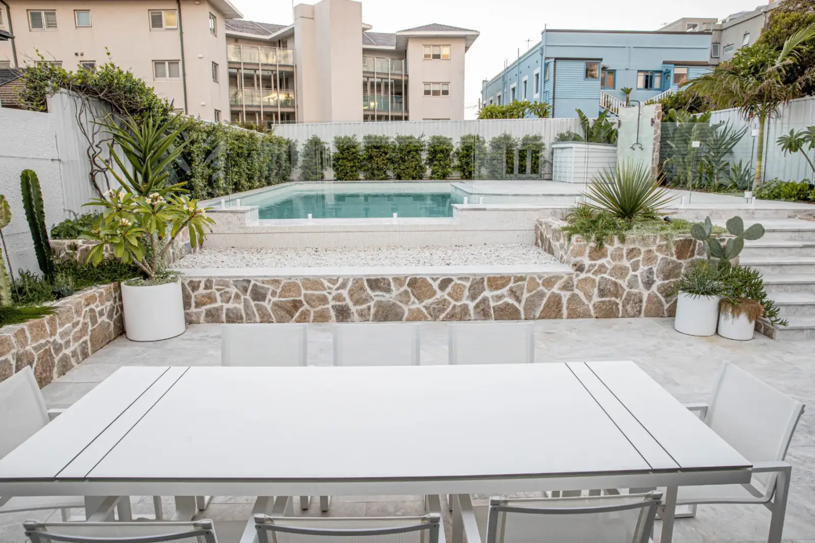 Wilson Project - poolside deck with shower and landscaping