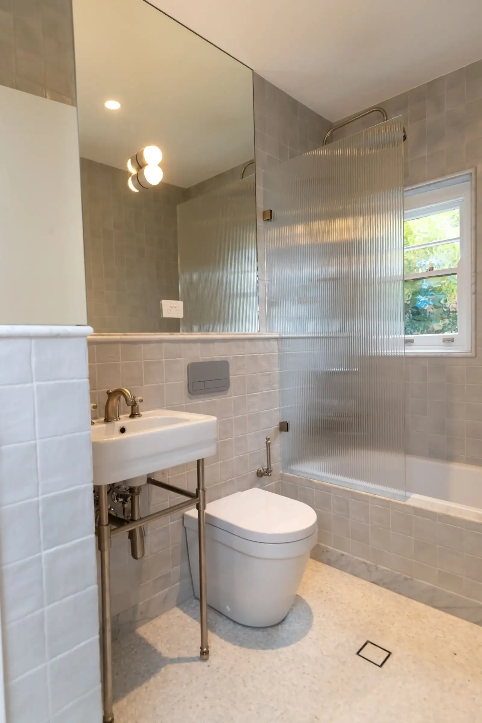 Eastern Project - bathroom with fluted glass and terrazzo floor