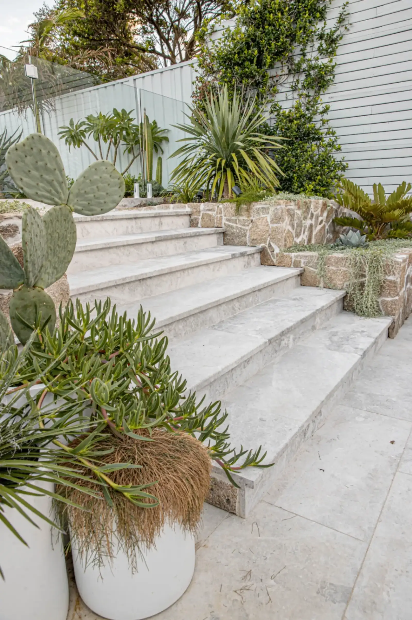 Wilson Project - limestone staircase with tropical landscaping