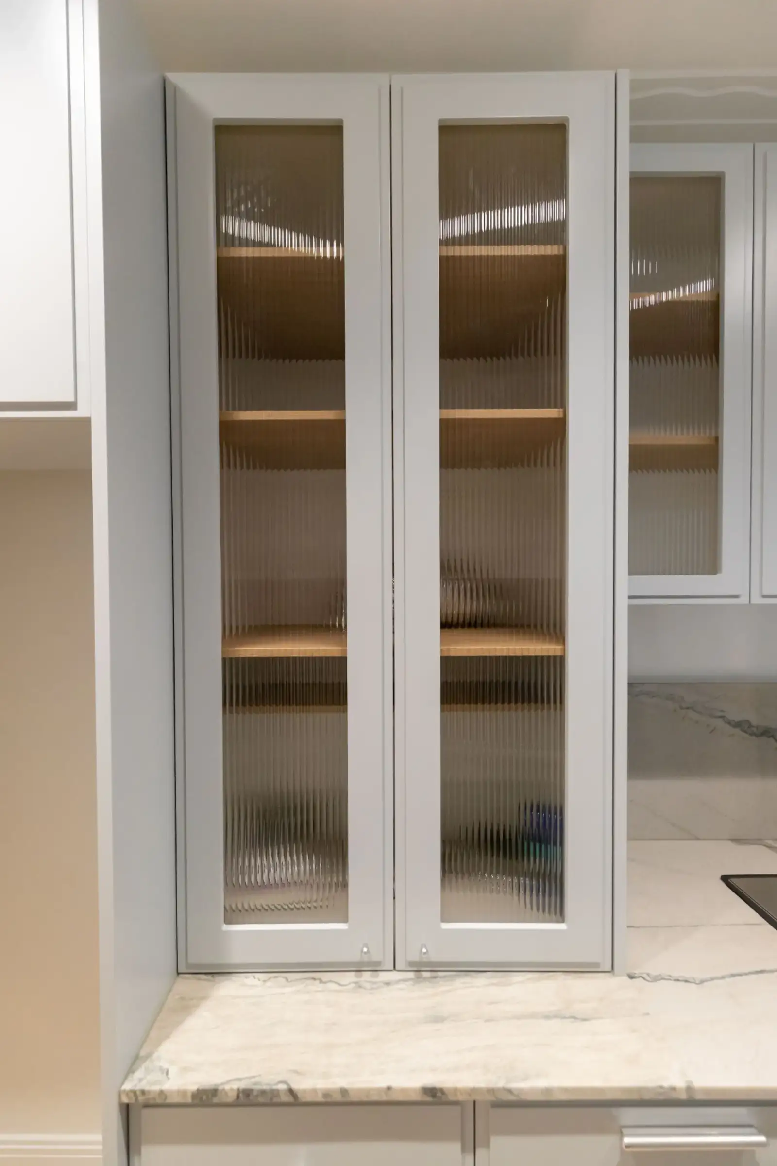 Eastern Project - fluted glass kitchen cabinetry
